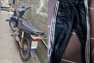 La moto usada por los atracadores y una de las prendas usadas en ese momento.